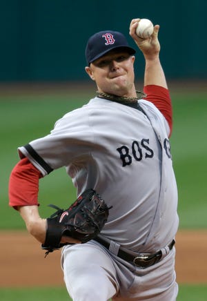 Red Sox starting pitcher Jon Lester delivers to the plate in the first inning of Boston 6-3 win over the Indians on Thursday. Lester allowed two runs in seven innings.