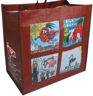 Brendan DiTullio’s design is at the lower left on this reusable Hannaford grocery bag. The bags will be available at the 181 stores in the Hannaford supermarket chain.