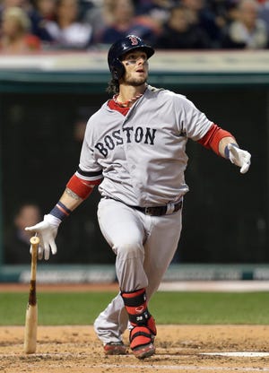 Boston Red Sox's Jarrod Saltalamacchia watches his solo home run off Cleveland Indians starting pitcher Zach McAllister in the fourth inning of a baseball game Thursday, April 18, 2013, in Cleveland. (AP Photo/Mark Duncan)