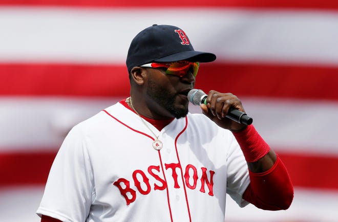 Boston Red Sox's David Ortiz speaks to the crowd before a baseball against the Kansas City Royals in Boston, Saturday, April 20, 2013. (AP Photo/Michael Dwyer)
