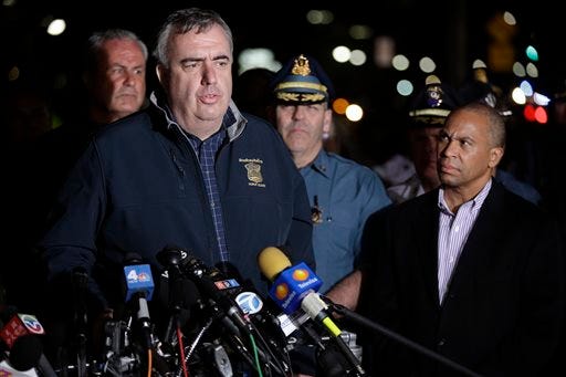 Boston Police Commissioner Ed Davis says he believes the Tsarnaev brothers were planning other attacks. Davis is seen here at the podium, while accompanied by State Police Col. Timothy Alben, second from right, and Massachusetts Governor Deval Patrick, right, during a news conference, after the arrest of a suspect of the Boston Marathon bombings in Watertown, Mass., Friday.