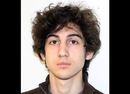 This file photo provided Friday, April 19, 2013 by the Federal Bureau of Investigation shows Boston Marathon bombing suspect Dzhokhar Tsarnaev. A court official says Dzhokhar Tsarnaev, the surviving suspect in the bombings, is facing federal charges and has made an initial court appearance in his hospital room.