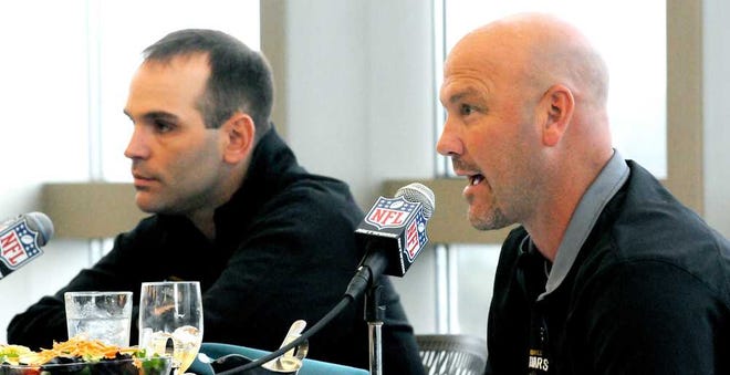 Bruce.Lipsky@jacksonville.com Jaguars coach Gus Bradley (right) and GM David Caldwell answer questions Monday at EverBank field about the upcoming NFL Draft.