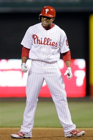 Philadelphia Phillies' Ben Revere reacts after hitting an RBI single off St. Louis Cardinals relief pitcher Mitchell Boggs during the eighth inning of a baseball game, Sunday, April 21, 2013, in Philadelphia. Philadelphia won 7-3. (AP Photo/Matt Slocum)