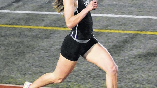Abby Moss took second in the 400 and helped the 4x400 team place first at the district meet April 11.