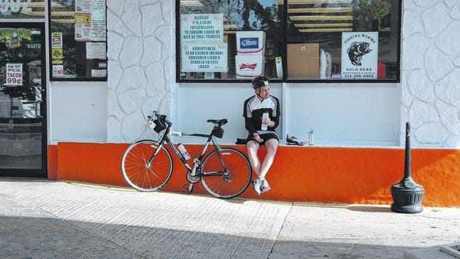 Bradley Girndt of Fayetteville stopped for a quick water and snack break while taking part in the BP MS 150 which came through Bastrop Sunday. The riders traveled on a 150-mile bike trek from Houston to Austin over two days to raise money for Multiple Sclerosis research.