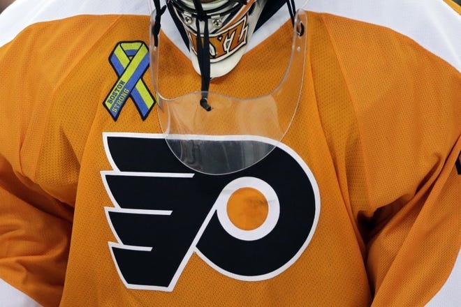 Flyers goalie Ilya Bryzgalov wears a Boston Strong patch on his uniform during warm-ups before Tuesday's game in Philadelphia.