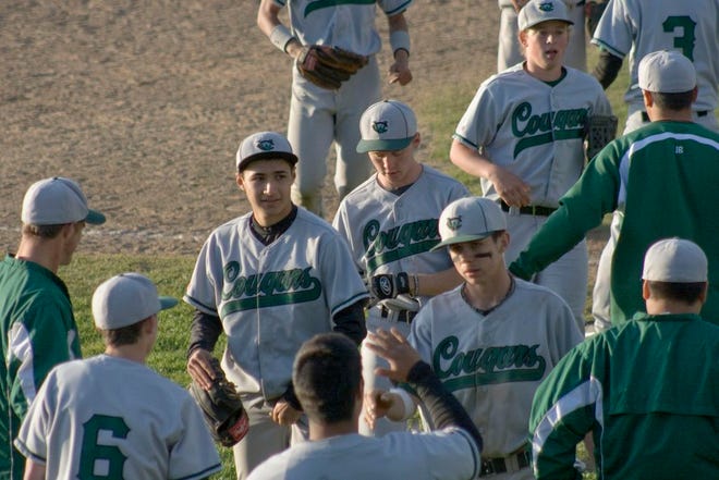 The 2013 Weed High School baseball team, shown following a doubleheader sweep against Burney April 19, 2013 at Son's Park in Weed.