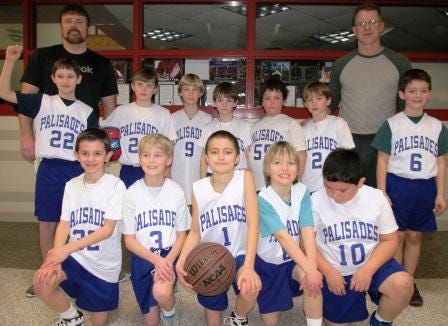 The Palisades Pirates were unbeaten in the Colonial Youth Basketball League. Team members include (front row, from left) Brendan Theesfeld, Thomas Kozlusky, Griffin Shankin, Justin Allman and Troy Macik. In the second row are Michael Naulty, Kaden Burke, Lucas Bottelier, Nicholas Phillipps, Shaeden Carr, Liam Carey and Gabe Freeman. In back are coaches Bill Burke and Dan Carey.