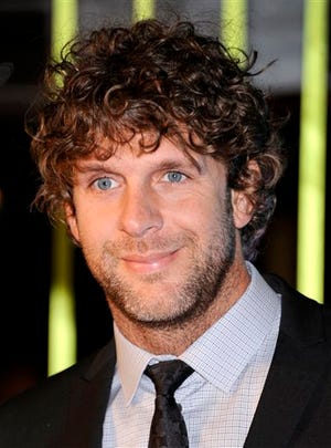 Billy Currington arrives at the 59th Annual BMI Country Awards in Nashville on in this Nov. 8, 2011 file photo. Currington was indicted Wednesday April 24, 2013 in Georgia on charges that he threatened bodily harm to a man older than 65.