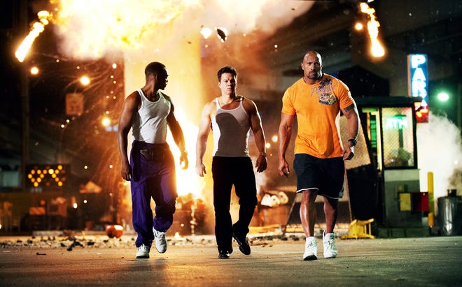 From left, Anthony Mackie, Mark Wahlberg, and Dwayne Johnson in "Pain & Gain."
