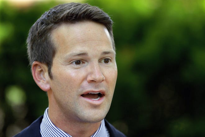 In this June 2012 photo file photo, Rep. Aaron Schock, R-Ill., speaks at the Illinois Governor's Mansion in Springfield, Ill. (AP Photo/Seth Perlman, File)