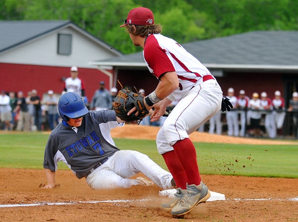 Etowah’s Blane Payne slides safely into third base as Southside’s Hunter Clough receives the throw during the first game of the teams’ best-of-three series in the second round of the Class 5A state playoffs Friday.