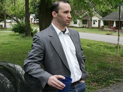 In this Tuesday April 23, 2013 file photo, Everett Dutschke stands in the street near his home in Tupelo, Miss., and waits for the FBI to arrive and search his home in connection with the sending of poisoned letters to President Barack Obama and others. FBI spokeswoman Deborah Madden says Dutschke, 41, was arrested Saturday, April 27, 2013, at his Tupelo home. U.S. Attorney Felicia C. Adams and Daniel McMullen, the FBI agent in charge in Mississippi, announced later Saturday that Dutschke has been charged with making and possessing ricin in the investigation into poison-laced letters sent to Obama, Sen. Roger Wicker of Mississippi and 80-year-old Mississippi judge Sadie Holland. (AP Photo/Northeast Mississippi Daily Journal, Thomas Wells, File)