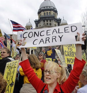 Gun owners and supporters participate in an Illinois Gun Owners Lobby Day rally March 7, 2012, at the Illinois State Capitol in Springfield.