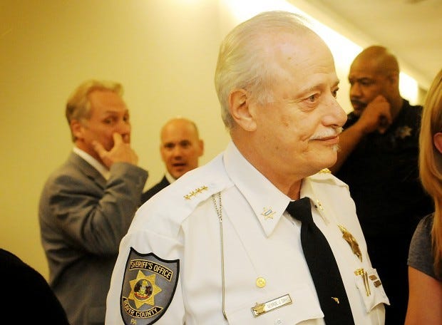 Sheriff George David remains free after the state Attorney General's office withdrew its motion to revoke his bond.