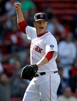 Boston Red Sox relief pitcher Andrew Bailey reacts after the final out of their 6-1 win over the Houston Astros Sunday in Boston.