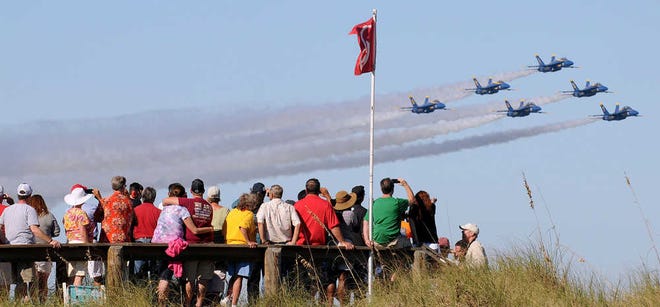 In this Oct. 21, 2012, photo the U.S. Navy's Blue Angels fly in formation above a crowd of spectators at the Jacksonville Sea and Sky Spectacular in Jacksonville Beach. The Blue Angels and the U.S. Air Force's Thunderbirds have cancelled their 2013 seasons because of the automatic federal budget cuts, causing about 60 cancellations thus far and affecting more than 200 of the approximately 300 air shows held each year. By BRUCE LIPSKY, Florida Times-Union