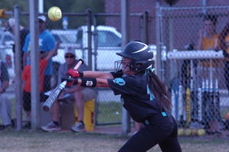 Destin's Jordan Malave tries to bunt the ball in the third inning against Ruckel.