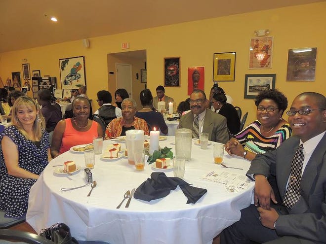 Banquet attendees enjoy dessert during the ACT-SO Awards Ceremony at the African-American Cultural Society.