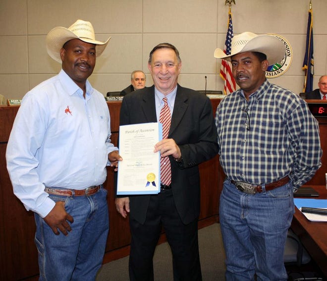 Ascension Parish President Tommy Martinez (center) presented a parish proclamation to Isaac King (left) and Archer Lee at the April 18 Ascension Parish Council meeting. President Martinez proclaimed May as National Black Rodeo Month in Ascension Parish.