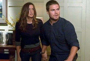 Katie Cassidy and Stephen Amell | Photo Credits: Jack Rowand/The CW