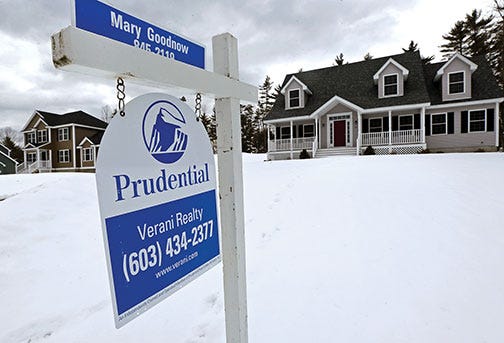 In this Tuesday, March 5, 2013, photo, a home is for sale in Auburn, N.H. Standard & Poor's/Case-Shiller reports on home prices in February on Tuesday, April 30, 2013. (AP Photo/Charles Krupa)