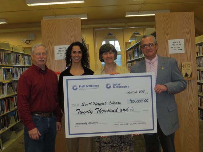 Courtesy photo

Pratt & Whitney United Technologies’ representative Steve Howe (far right) presents a $20,000 donation to South Berwick Library Director Karen Eger while Library Capital Campaign Committee members (left to right) Dave Stansfield and Maya Bogh look on.  This donation brings the fundraising total over $835,000, leaving approximately $250,000 to be raised to complete the new library. For more information, www.friendsofsouthberwicklibrary.org.
