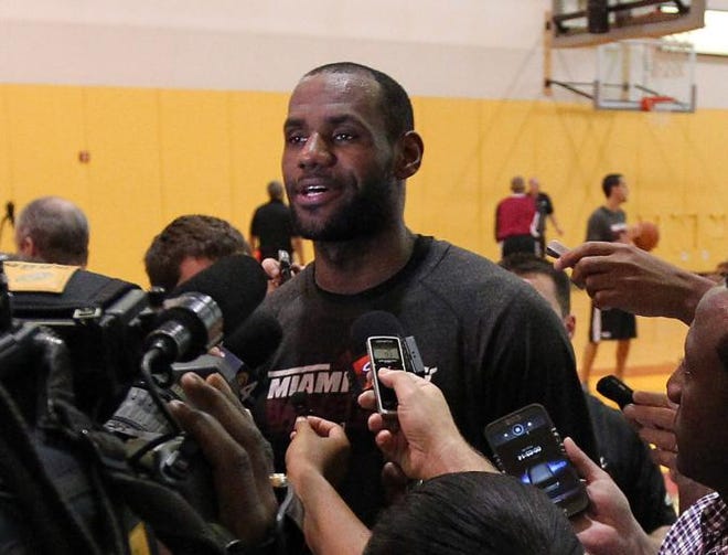 Miami Heat forward LeBron James speak to reporters at American Airlines Arena in Miami on Friday, May 3, 2013.