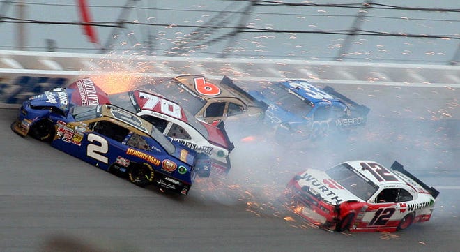 Brian Scott (2) crashes with Johanna Long (70), Trevor Bayne (6), Ty Dilon (33) and Sam Hornish Jr. during the Nationwide Series race at the Talladega Superspeedway.