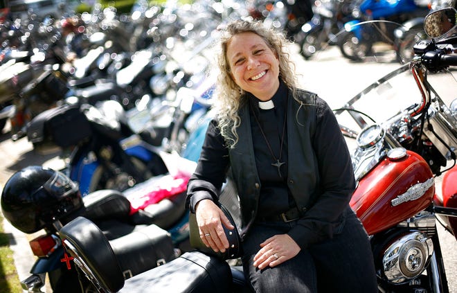 Rev. Vicki Pretti on her Harley Davidson motorcycle. Both she and her husband ride.