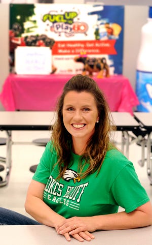 Apache Smothers, child nutrition program manager at Hokes Bluff Middle School, has been named Alabama's Fuel Up to Play 60 Program Advisor of the Year. She is seen Monday, May 6, 2013, at the school in Hokes Bluff, Ala.