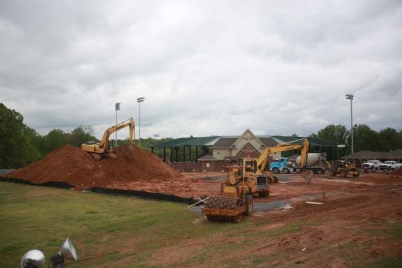 Ben Earp/The Star Construction continues (photo taken May 3, 2013) on the Plaza of Champions in front of Veterans Field/Keeter Stadium on the campus of Shelby High School.