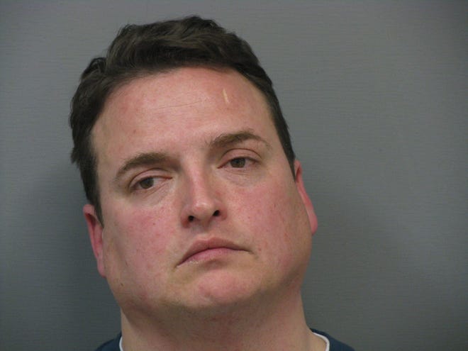 Michael Bourque, 42, of Natick is seen here in a 2011 mugshot from Natick Police.