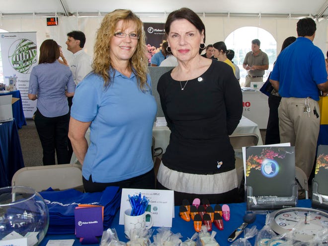 Valinda Bronte and Jeannie Deegan at 10th Annual Celebration of Biotechnology at RTI Biologics on Thursday in Alachua.