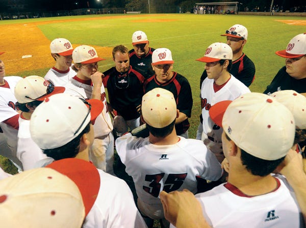 Westbrook Christian coach Matt Kennedy talks to his team after the Warriors defeated Ranburne on Tuesday.
