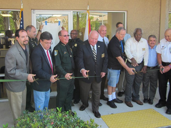Guests including Flagler County Sheriff Jim Manfre and members of the Palm Coast City Council, cut the ribbon Friday morning and open the new Palm Coast Sheriff's precinct to the public.