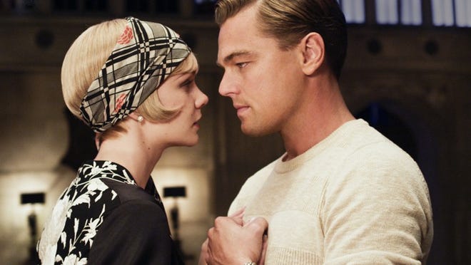 Carey Mulligan as Daisy Buchanan and Leonardo DiCaprio as Jay Gatsby in Warner Bros. Pictures' and Village Roadshow Pictures' drama 'The Great Gatsby.'