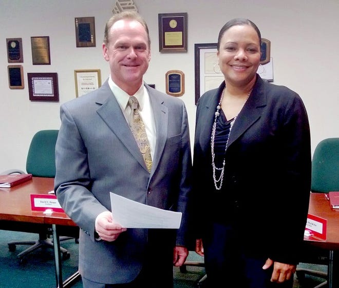 Natalie Collins of Burlington Township was officially sworn in as a Burlington County College trustee by former Superior Court Judge Evan H. C. Crook, the solicitor for the trustee board, in March.