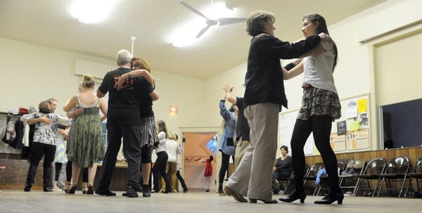 Partners take turns leading during one of the Thursday events hosted by Cape Cod Tango at Liberty Hall in Marstons Mills.