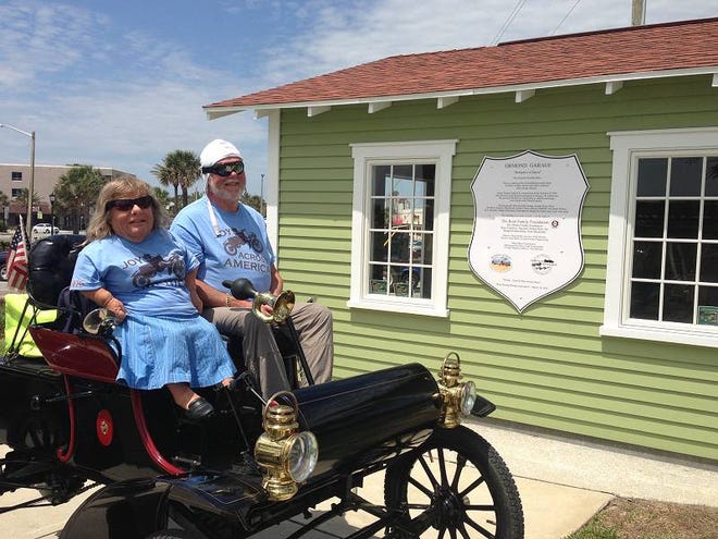 Joy Rainey and Jim Cobb in a 1904 Curved Dash Olds arrive at the Birthplace of Speed Park in Ormond Beach.