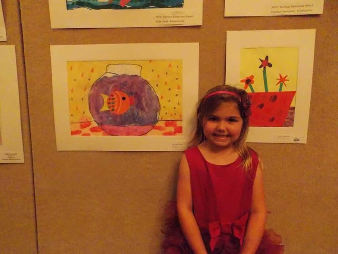 Student Bella Davidson poses with her original artwork at the Ponte Vedra Public Education Foundation Artworks Celebration on May 5.