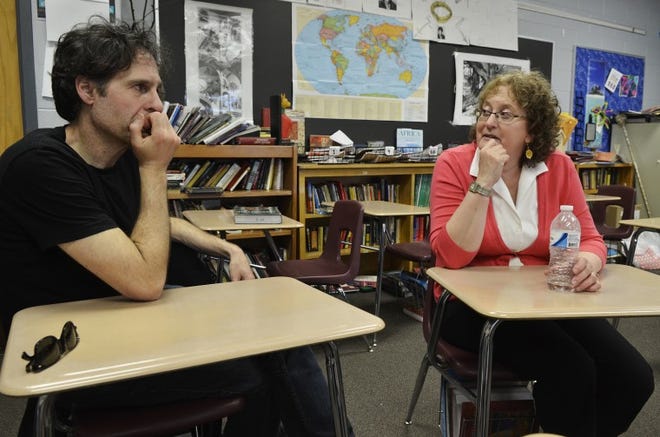 Children's book author and illustrator Peter Catalanotto and English teacher Kristen Swanson talk about their ideas for a children's book writing workshop in Rwanda after meeting in person for the first time in Swanson's classroom at Pennridge Central Middle School.