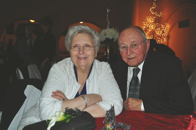 Norma Stuckey, left, sits with her husband Keith.