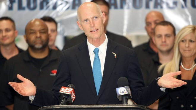 Gov. Rick Scott addresses guests and members of the media during his visit to Parametric Solutions in Jupiter on Tuesday to tout the Florida legislature’s passage of a sales tax break for manufacturers. (Bill Ingram/The Palm Beach Post)