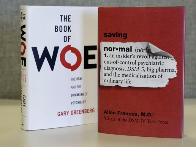 The books "The Book of Woe"  by Gary Greenberg and "Saving Normal" by Allen Frances criticize changes in an update of psychiatry's most widely used guidebook for diagnosing mental illness. They argue that the American Psychiatric Association's guidebook is turning normal human conditions into mental illness and will lead to even more overuse of psychiatric drugs. 
(M. SPENCER GREEN | THE ASSOCIATED PRESS)