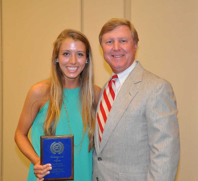 Augusta Exchange Club Youth of the Year Nina McCallie poses for a picture with Tat Thompson of the club.