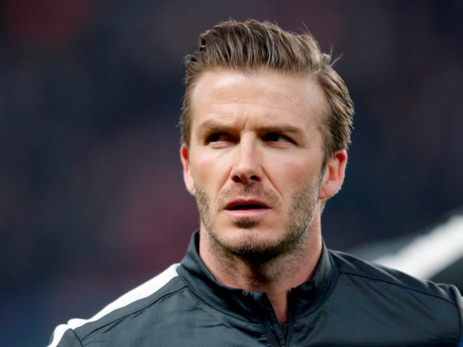 David Beckham, 38, who recently won a league title in a fourth country with Paris Saint-Germain, said Thursday he will retire after the season. (Associated Press photo)