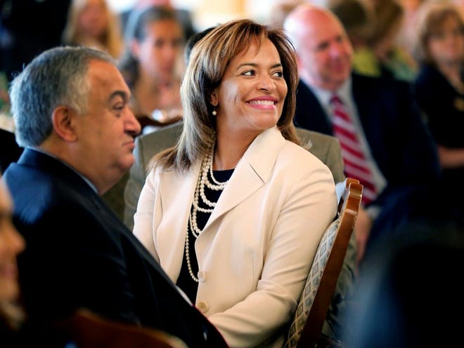 Ava Parker, chief operating officer for Florida Polytechnic University, listens to the speakers at the Lakeland Area Chamber of Commerce Legislative Wrap-Up Breakfast at the Lakeland Yacht Club on Thursday. Her university's appropriations were restored to the budget presented to Gov. Rick Scott.