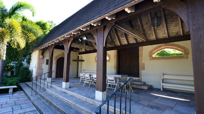 A proposal to place folding French glass doors on the front of the three-sided tea house structure in the Cluett Memorial Garden was rejected by Landmarks commissioners.